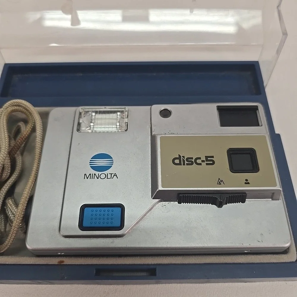 Minolta Disc‎ 5 Disc Film Camera, silver, with Case